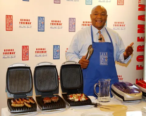 Getty Images Foreman launches his grill in London, UK, in 2001