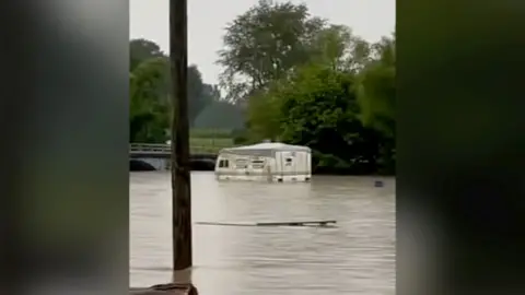 A motorhome in high waters.