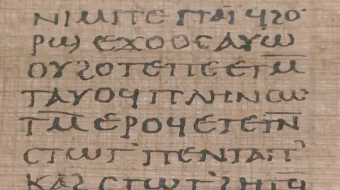  Reuters A view of the Crosby-Schoyen Codex, written in Coptic on papyrus around 250-350 A.D. and produced in one of the first Christian monasteries