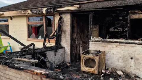 Rubble in a fire damaged house