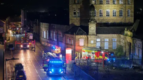 Gazz Hall Six fire engines outside a derelict mill in West Yorkshire 