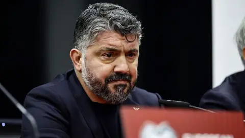 Getty Images Rino Gattuso with grey hair and a beard