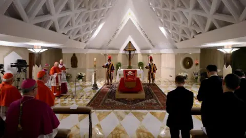 Reuters The body of Pope Francis lies in an open casket in Santa Marta residence at the Vatican.