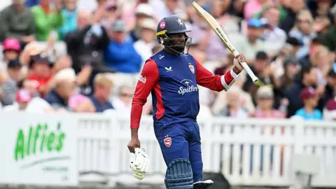 Kent's Daniel Bell-Drummond salutes the crowd after scoring a century against Somerset in the T20 Blast