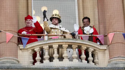 John Fairhall/BBC Actors portraying Wolsey and Henry VIII with the Ipswich mayor