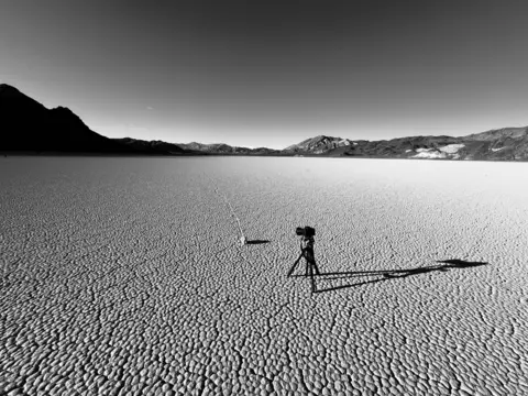 Harald Loeffler A camera stands on a tripod in Death Valley