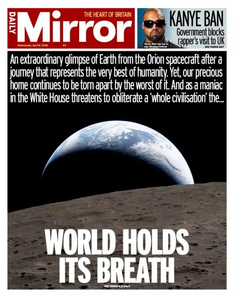 The headline on the front page of the Mirror reads: “World holds its breath”.