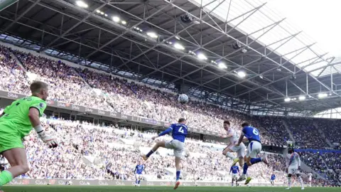 Action Images via Reuters/Jason Cairnduff In the centre of the image, Crystal Palace's Jorgen Strand Larsen heads the ball inside a packed Hill Dickinson Stadium, during the Everton v Crystal Palace match on 22 August, 2026.

