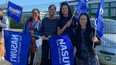 Stewart Halforty/NASUWT Dr Kadiatu Kanneh-Mason and three of her daughters