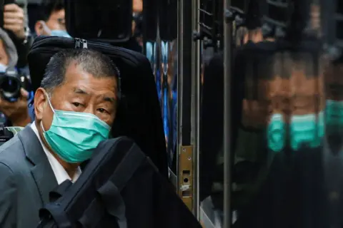 Reuters  Media tycoon Jimmy Lai, founder of Apple Daily, looks on as he leaves the Court of Final Appeal by prison van, in Hong Kong, China February 1, 2021