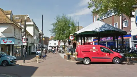 A Google street image of Ashford High Street