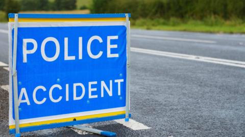British police accident sign at the side of the road