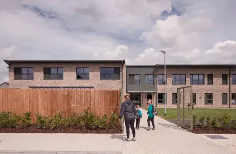 David Barbour Riverside Primary School - a brick school building