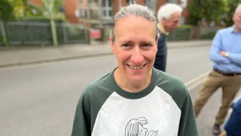 Barbara Loester stood during the strike action