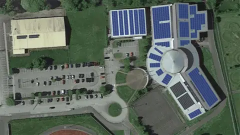 South Kesteven District Council An aerial illustration showing how the blue solar panels will be fitted on the roof of the leisure centre