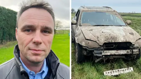 John Devine/BBC/Mathew Latta A split image showing Mathew Latta on the left, a man with short brown hair, wearing a raincoat over a blue collared shirt, standing in a green field by a hedge. On the right is a 4x4 in a field, which appears covered in dirt and scorch-marks, with the front grill having fallen off along with other damage.