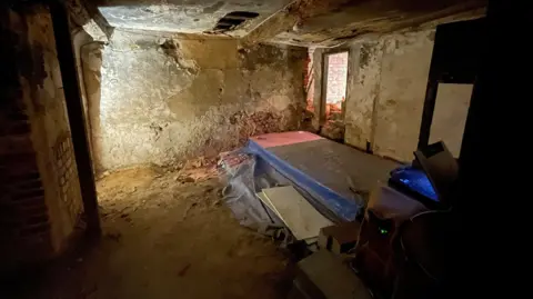 Shaun Whitmore/BBC Underground shop