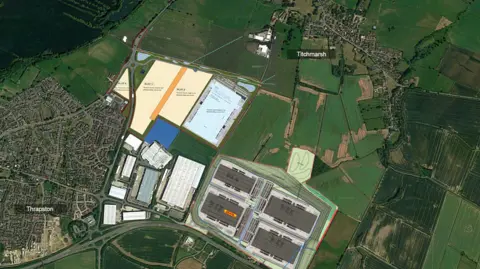 Staunch/Google A map showing an aerial view of the town of Thrapston and village of Titchmarsh. Between them are several fields, with the industrial estate marked out in white. A blue square shows where the Saica warehouse would go, and two other adjacent areas mark out eight large warehouses - which would triple the size of the existing industrial estate.