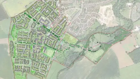 A drawing of a map outlines the scale of the development. A red line circles the plot of land to be used. The outlined land contains buildings, shrubs, trees.