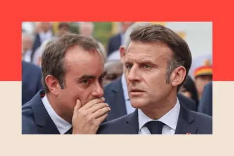 LUDOVIC MARIN/AFP via Getty Images France's President Emmanuel Macron (R) speaks with Sebastien Lecornu (L)