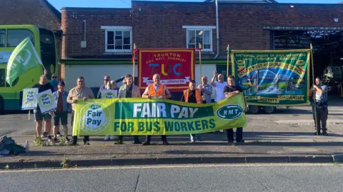 BBC RMT Union members take strike action outside Taunton bus depot