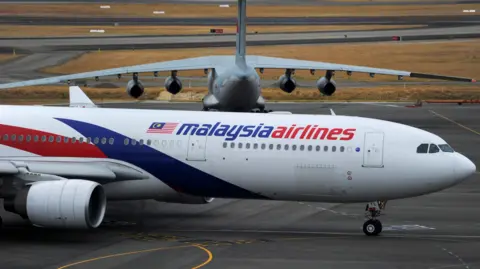 Getty Images Foto file pesawat Malaysia Airlines mirip dengan yang hilang.