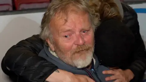Tearful football fan after watching his side win.