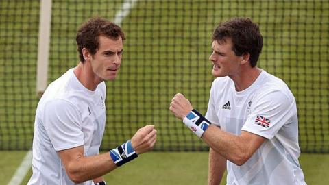 Andy and Jamie Murray celebrate winning a point at the 2012 Olympics