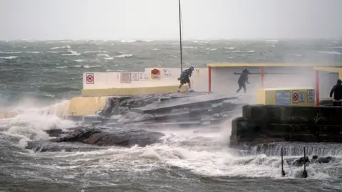 PA Media Storm Isha hits Salthill in Galway