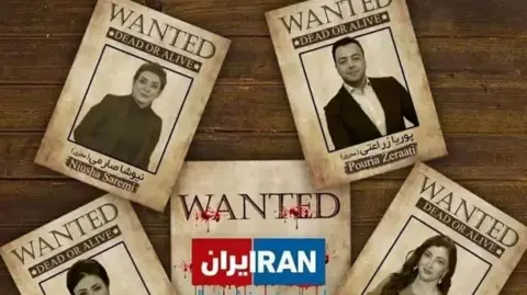  dead or alive" posters that were put up in Tehran, Iran, with photographs and names of individuals including Pouria Zeraati
