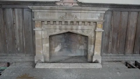 Qays Najm/BBC A fire place inside the buiding