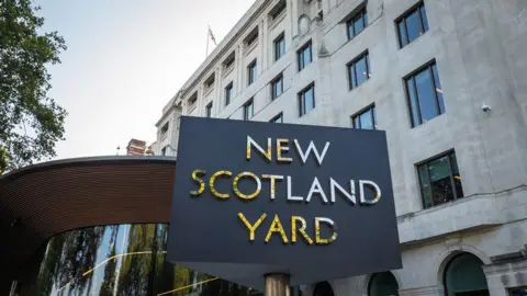 Getty Images New Scotland Yard sign outside the Met Police HQ