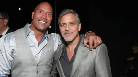 Dwayne Johnson and George Clooney