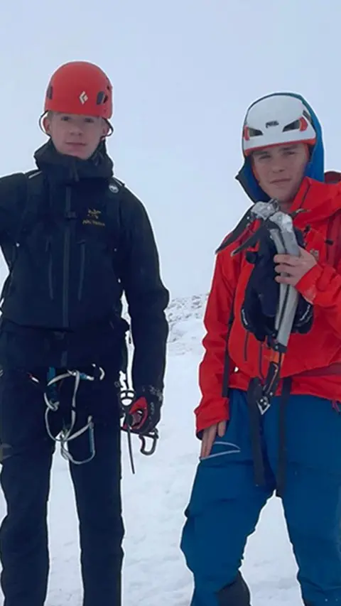 Caelan, 16, and Rowan, 15 on a snowy Helvellyn in the Lake District