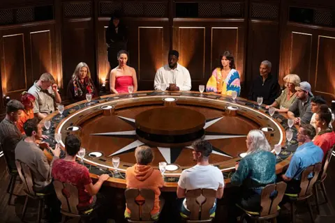 BBC Pictures Contestants sit at the roundtable in the opening episode of The Traitors, season four