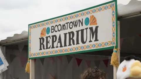 Boomtown Repairium sign.