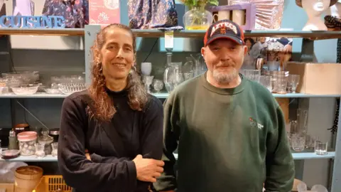 Emmaus A woman and a man looking at the camera