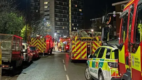 High rise tower fire on the 18th floor - ten fire engines and one ambulance at the scene.