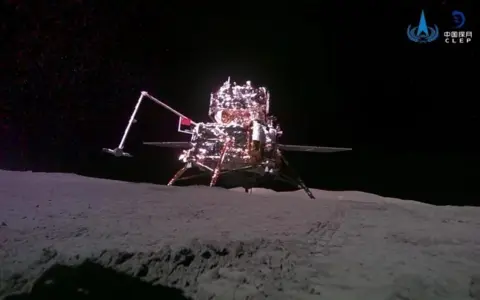 CNSA The Chang'e-6 lander sitting on the rocky surface of the moon.