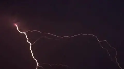 Mark Griffiths A fork of lightning in a dark sky in Chester