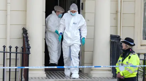 Police leaving Moon's Lodge 