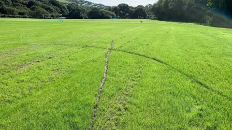 Llangynwyd Rangers BGCW FC Football pitch with deep tyre tracks running through it