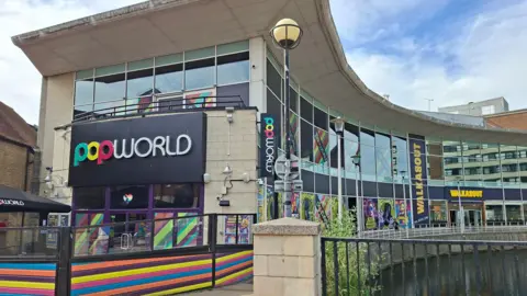 An image of Popworld and Walkabout which is the next building