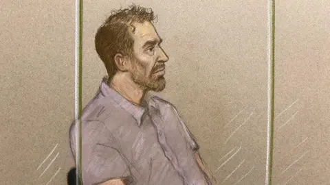A court sketch of a man in a dock