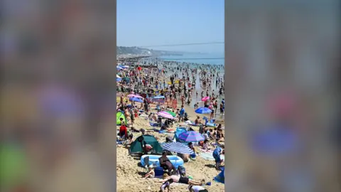 Busy beach in the UK.