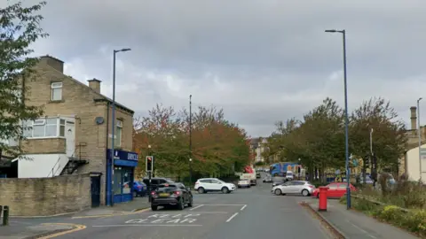 The junction of Whetley Hill, Whetley Lane and Toller Lane. A busy cross roads with traffic lights