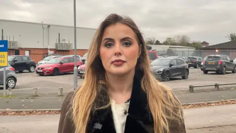 Rosey Hudson standing in front of the Copeland Street car park in Derby