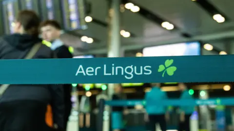 PA Aer Lingus check-in desk at airport 