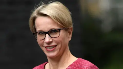 Dame Emma Walmsley, the outgoing chief executive of GSK, pictured wearing a pink jumper as she arrives for a meeting at Downing Street.