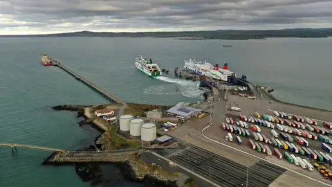 A general view of Holyhead port with one car ferry leaving its berth and another at its berth